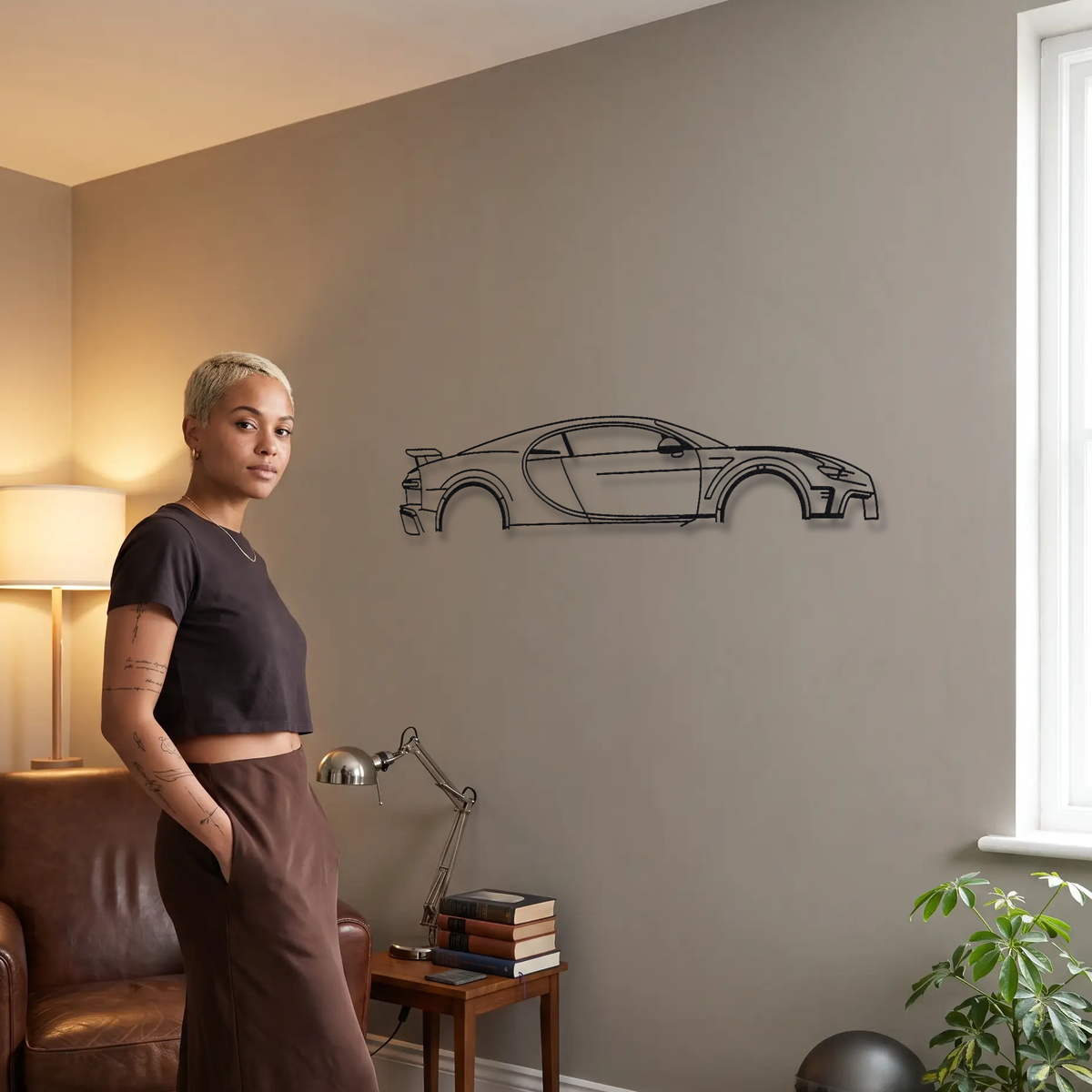 Bugatti Chiron Pur Sport metal wall art shown to scale beside a person