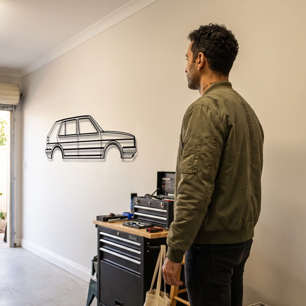 Volkswagen Golf GTI MK2 metal wall art shown to scale beside a person
