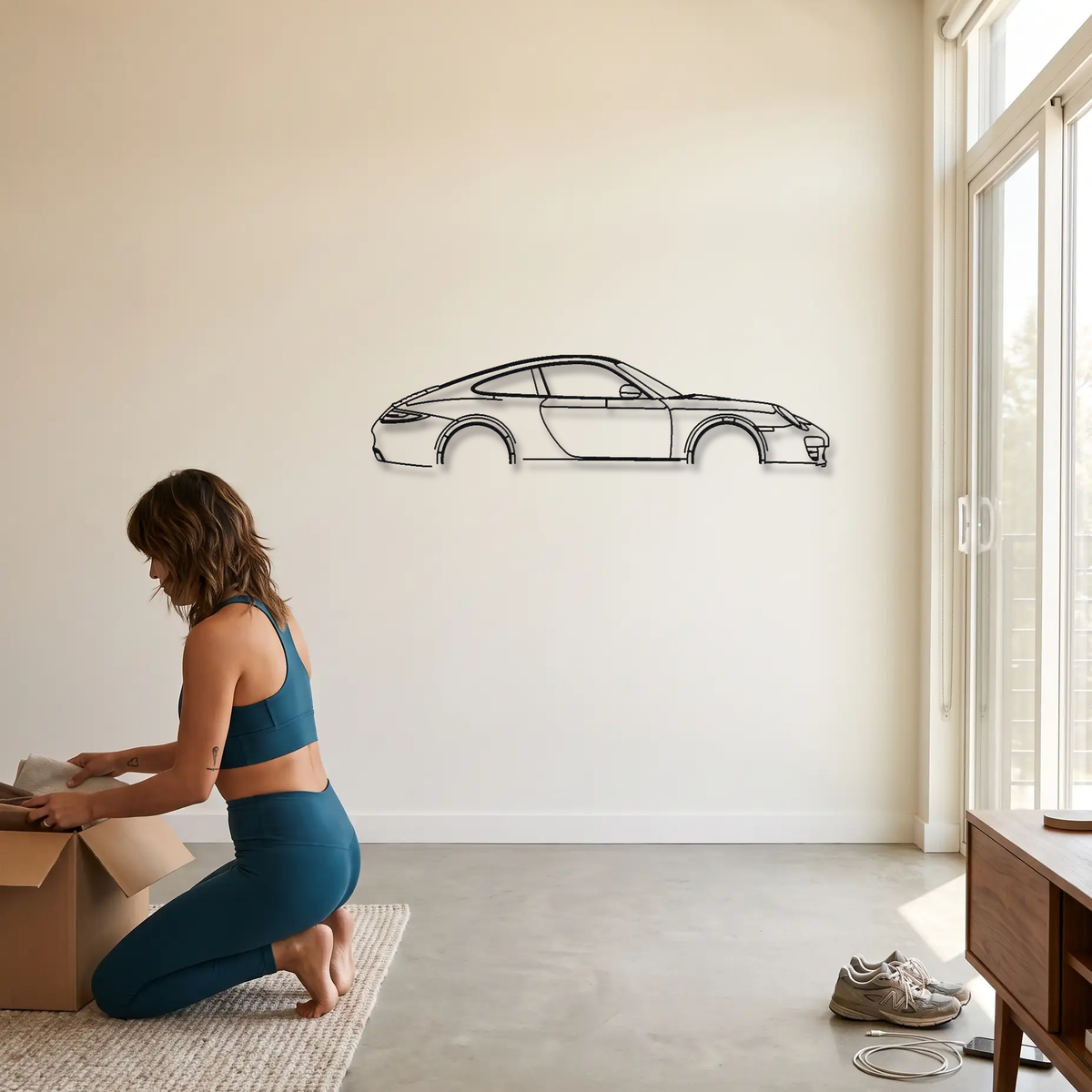 Porsche 911 Carrera 997.2 metal wall art shown to scale beside a person