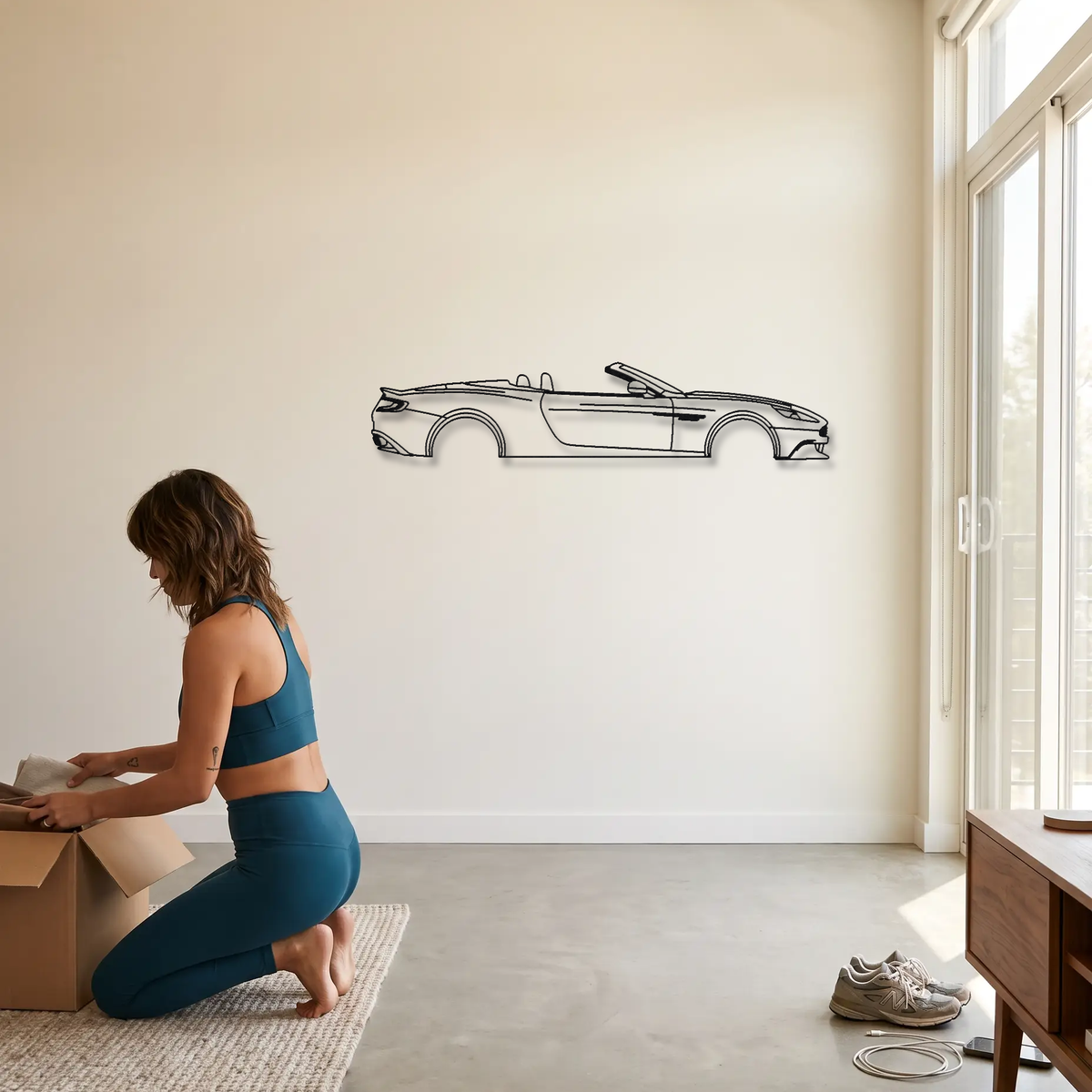 Aston Martin Vanquish Volante metal wall art shown to scale beside a person