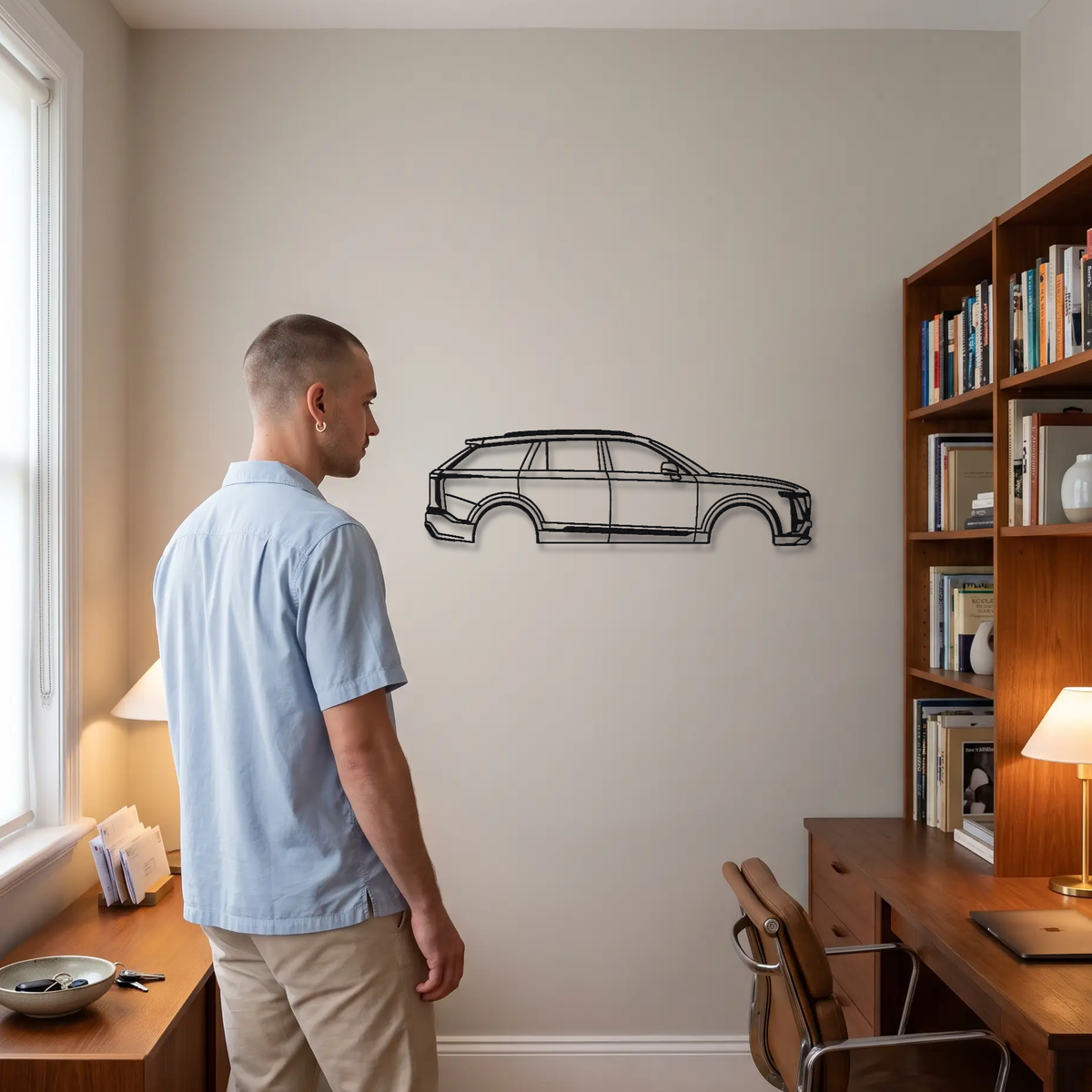 2026- Cadillac Lyriq-V metal wall art shown to scale beside a person