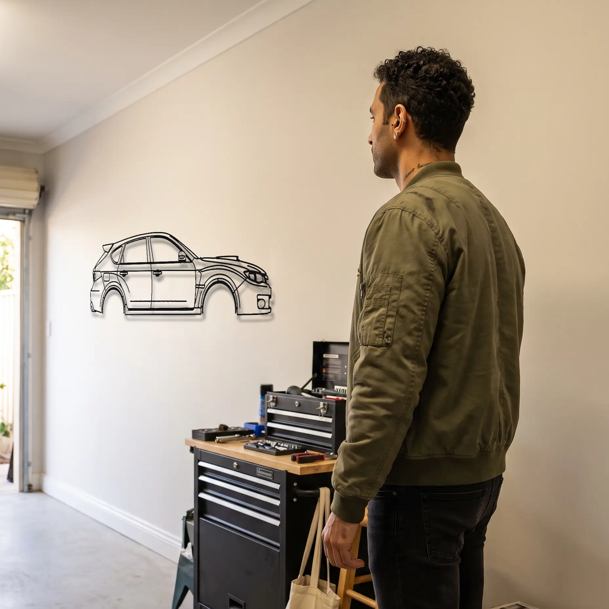 2008-2014 Subaru Impreza WRX STI GRB metal wall art shown to scale beside a person
