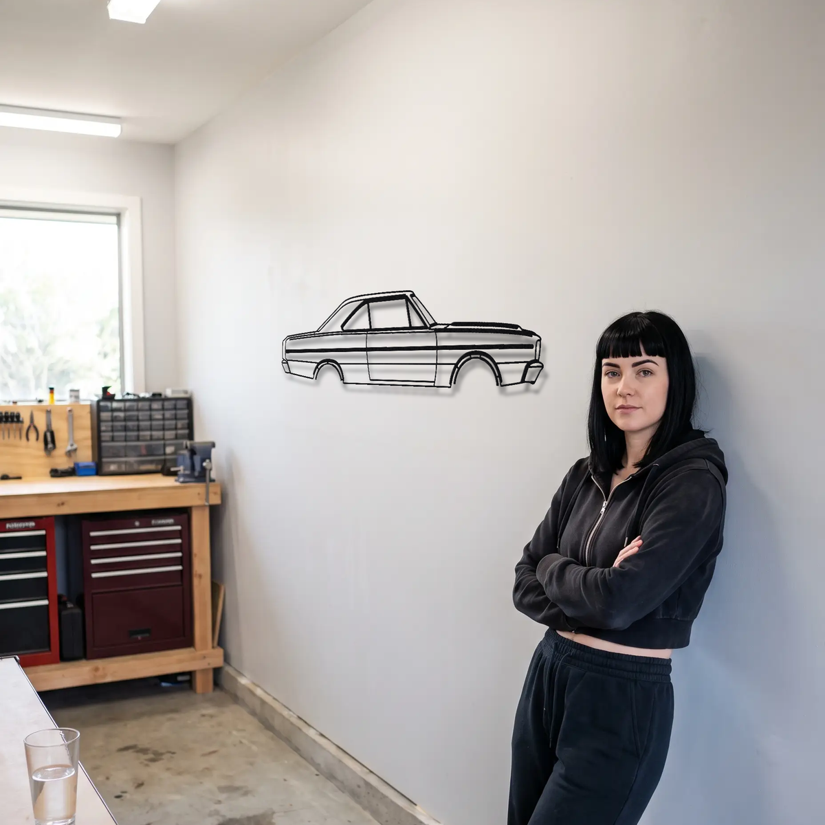 Dodge Dart GTS metal wall art shown to scale beside a person
