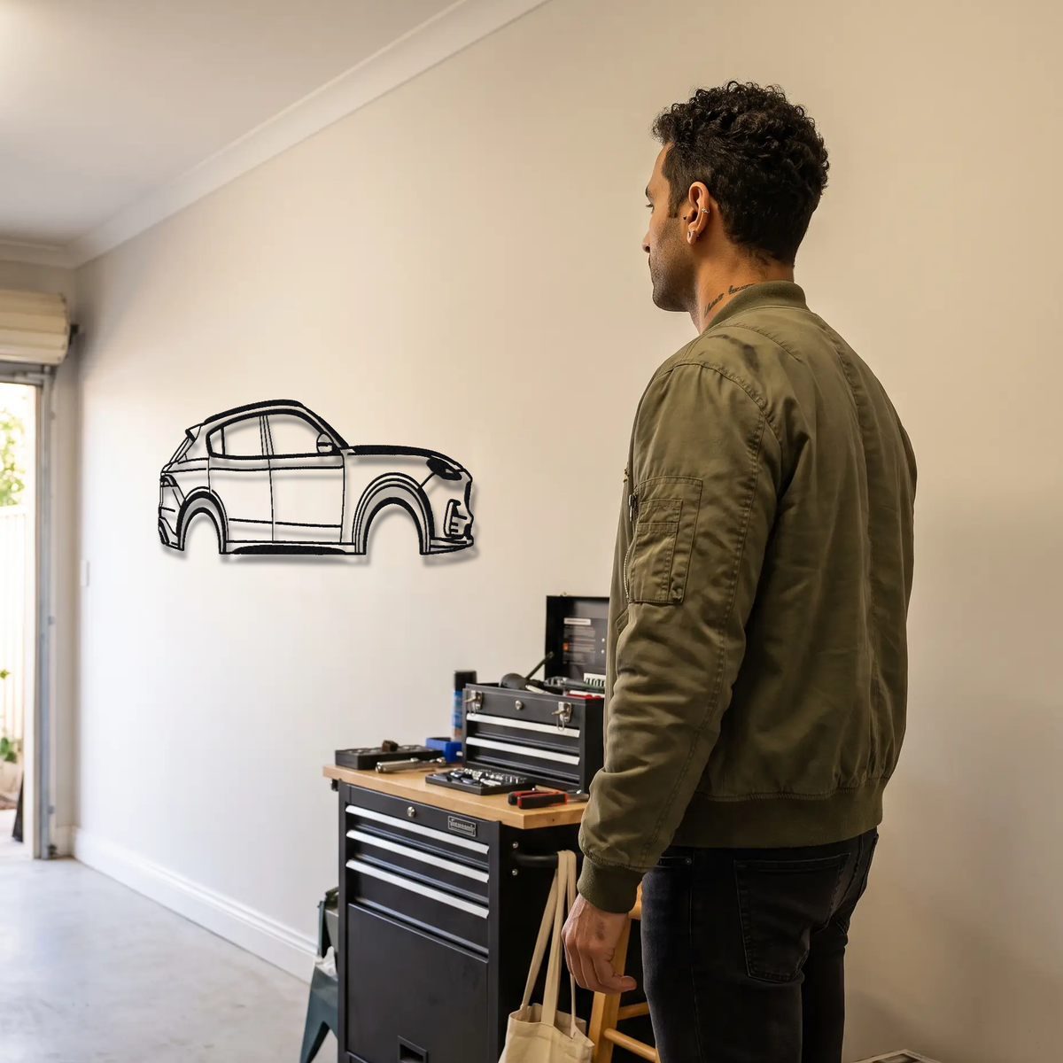 2023- Maserati Grecale Trofeo metal wall art shown to scale beside a person