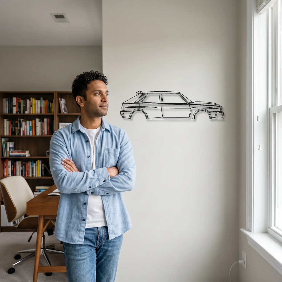 Automobili Amos Lancia Delta Futurista metal wall art shown to scale beside a person