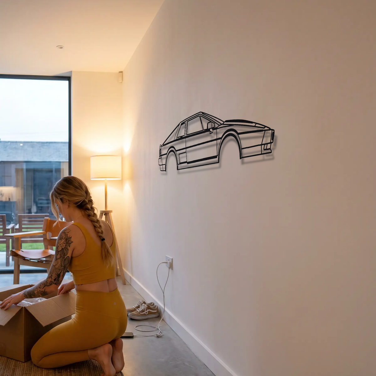 Lotus Esprit S4 metal wall art shown to scale beside a person