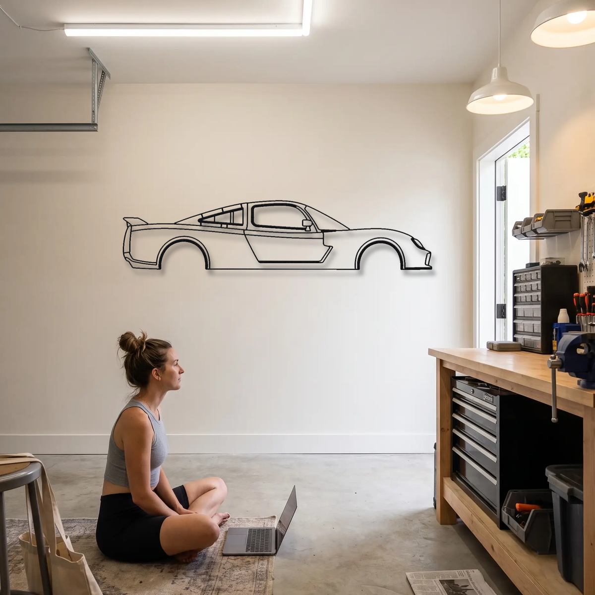 Ultima RS metal wall art shown to scale beside a person