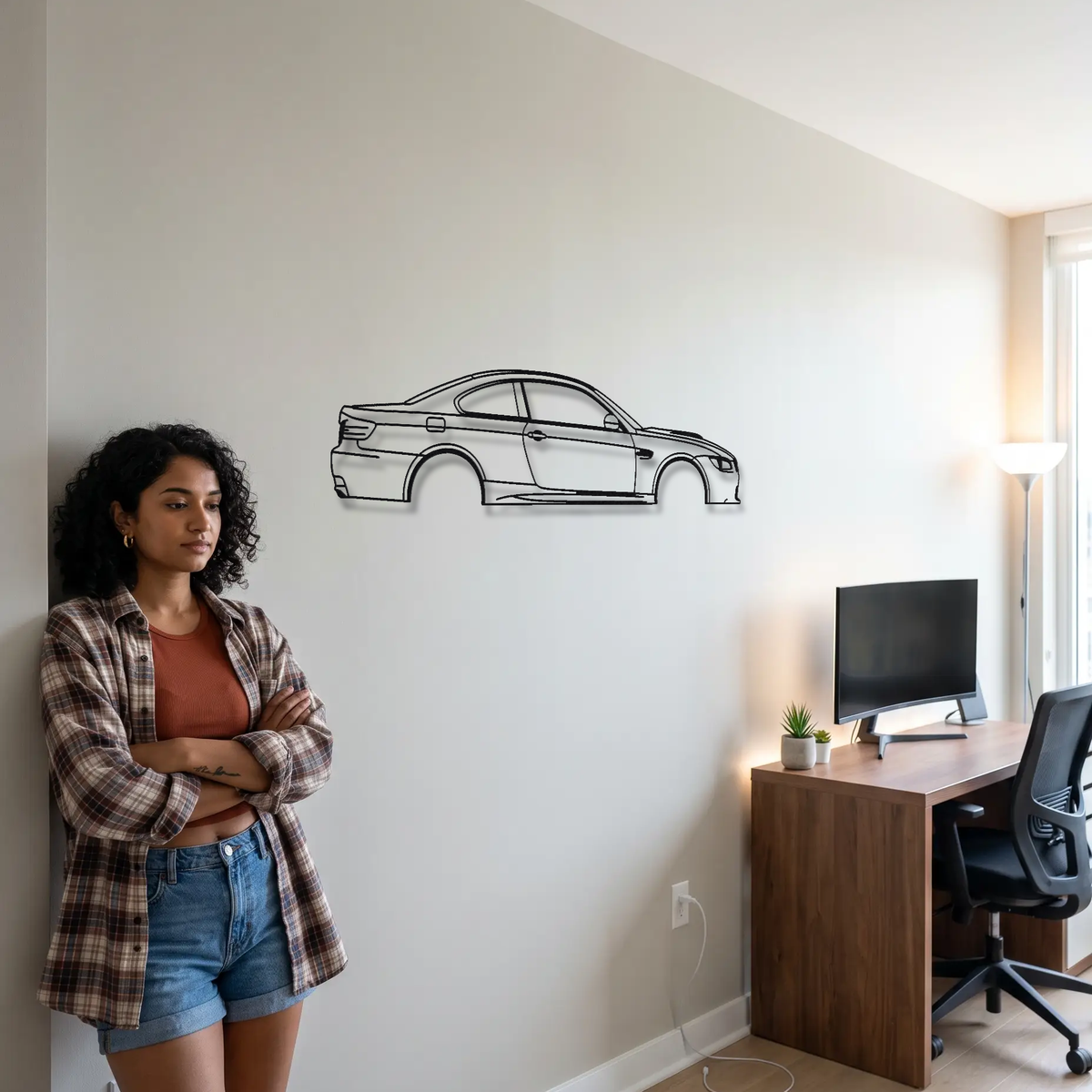 BMW M3 E92 metal wall art shown to scale beside a person