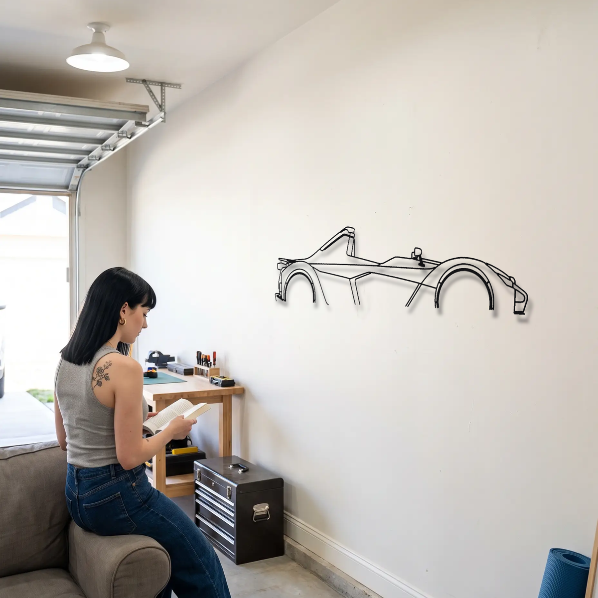 BAC Mono Gen 1 metal wall art shown to scale beside a person