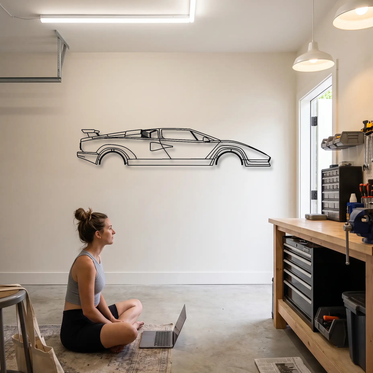 Lamborghini Countach 25th Anniversary metal wall art shown to scale beside a person