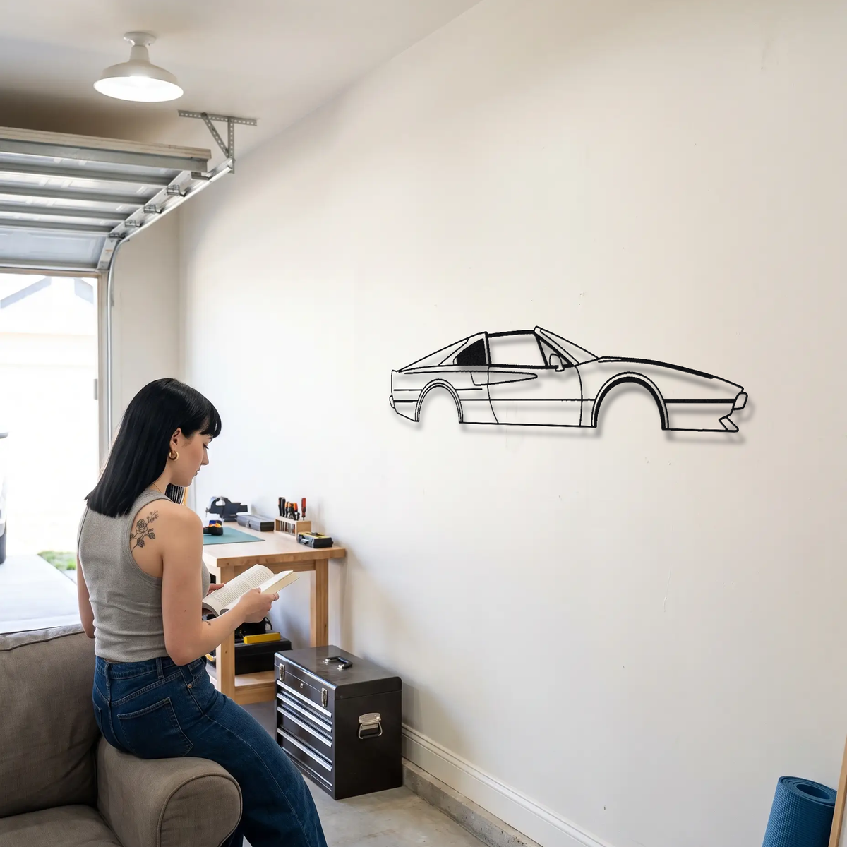 Ferrari 308 GTS metal wall art shown to scale beside a person