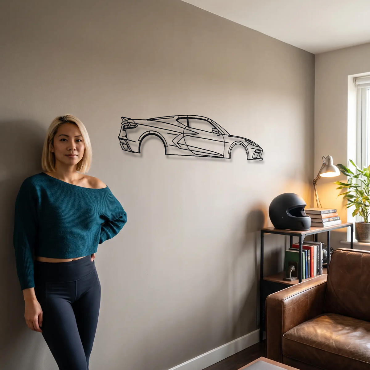Chevrolet Corvette C8 metal wall art shown to scale beside a person