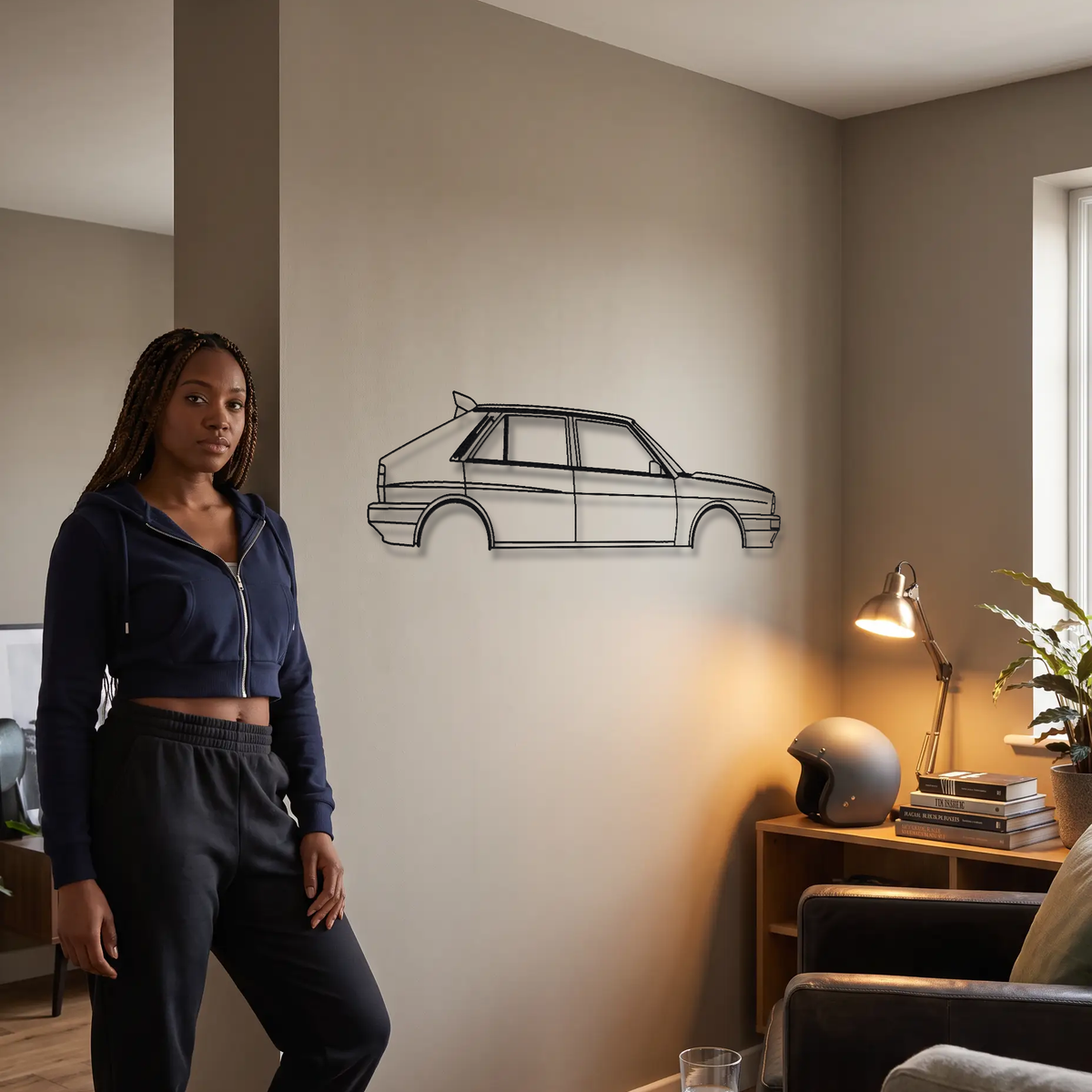 Lancia Delta HF Integrale Evoluzione I metal wall art shown to scale beside a person