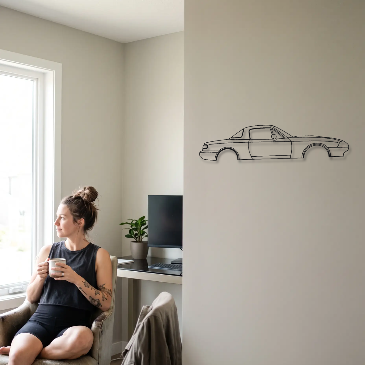 Mazda MX-5 Miata NA metal wall art shown to scale beside a person