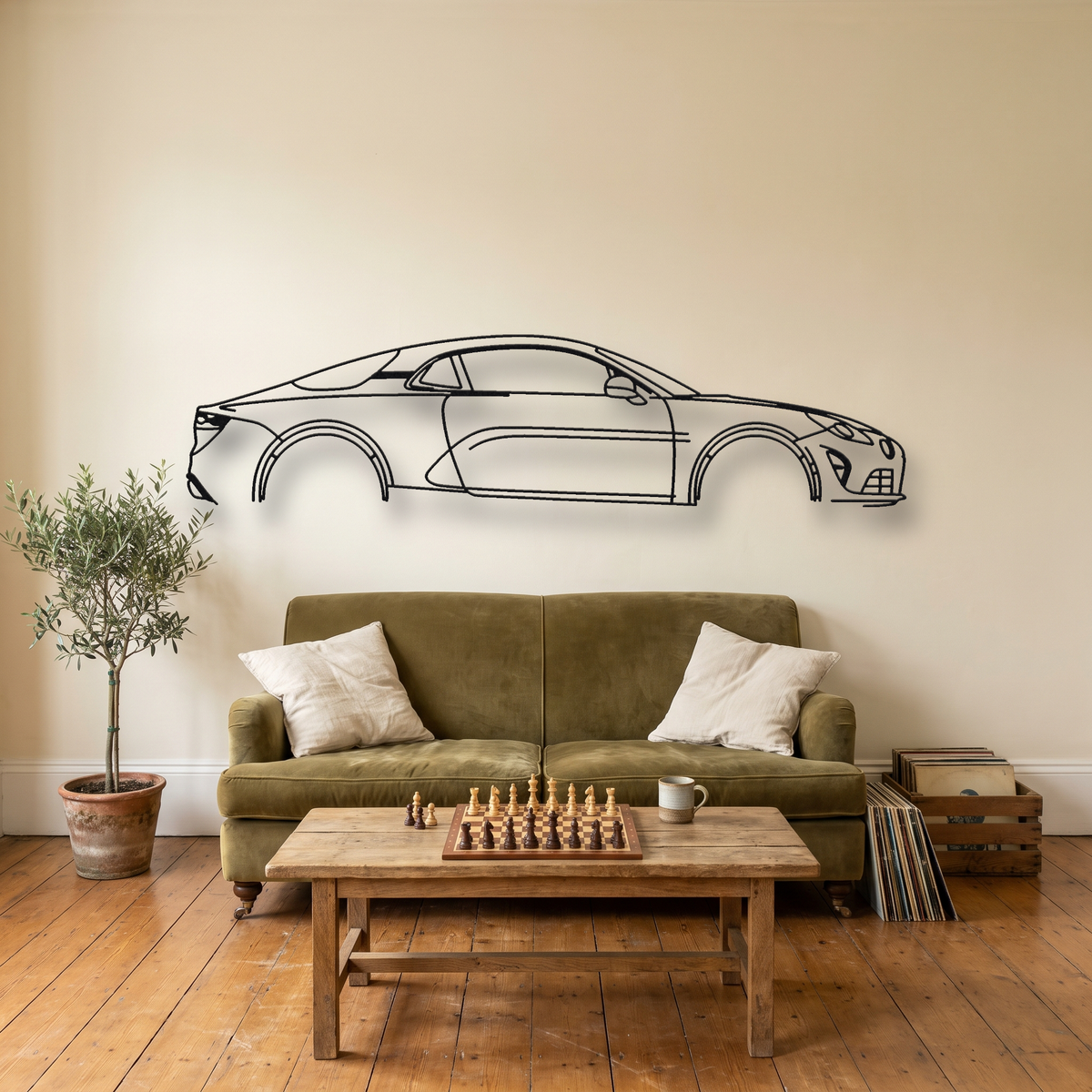 Alpine A110 Gen 2 metal wall art silhouette, front view on wall