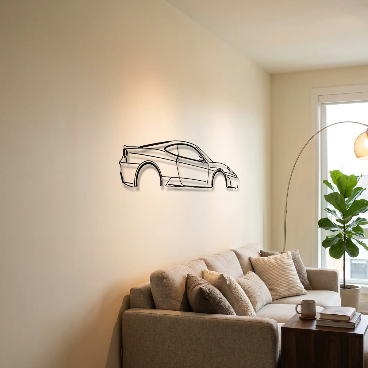 Ferrari F430 metal wall art above a sofa in a living room