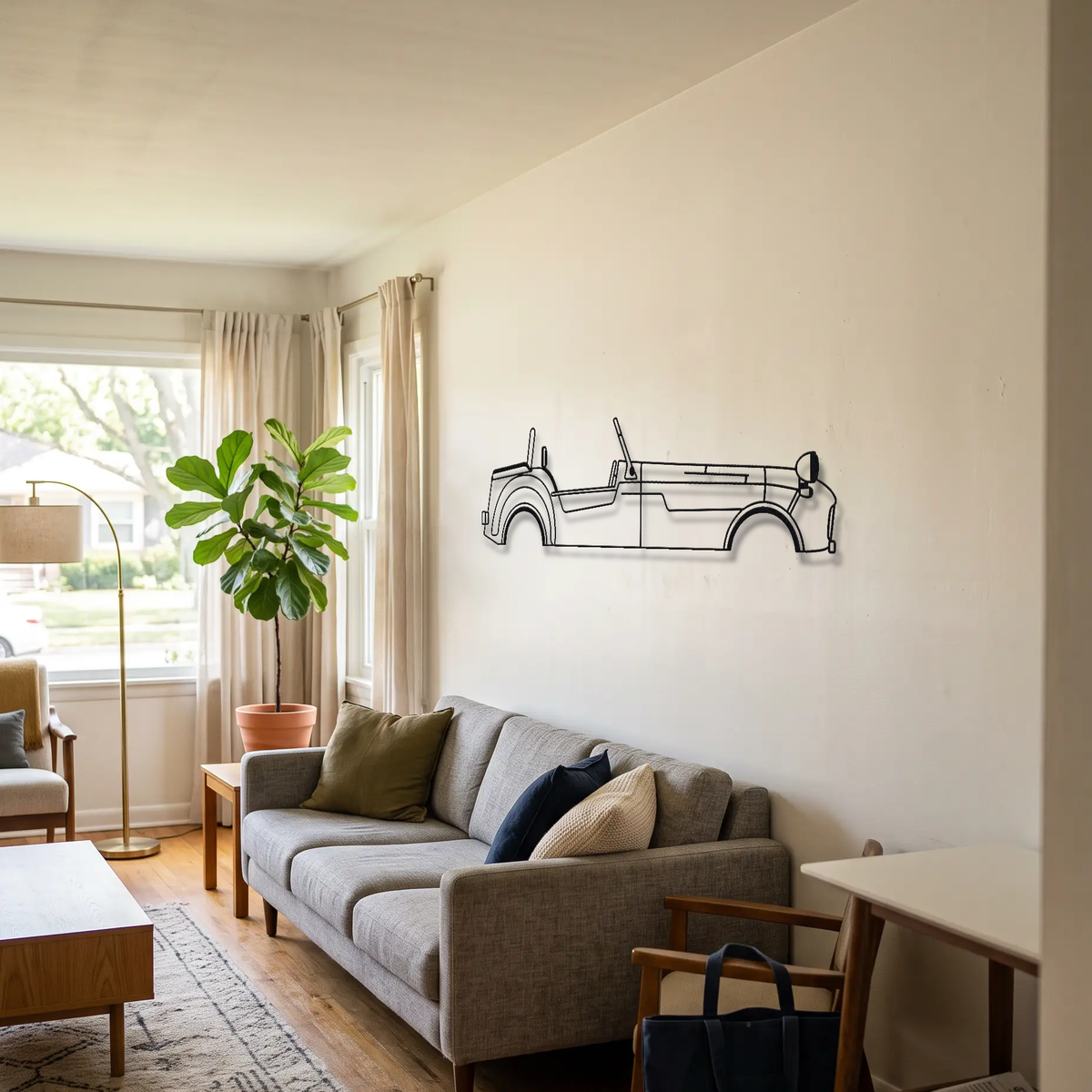 Caterham Super Seven metal wall art above a sofa in a living room