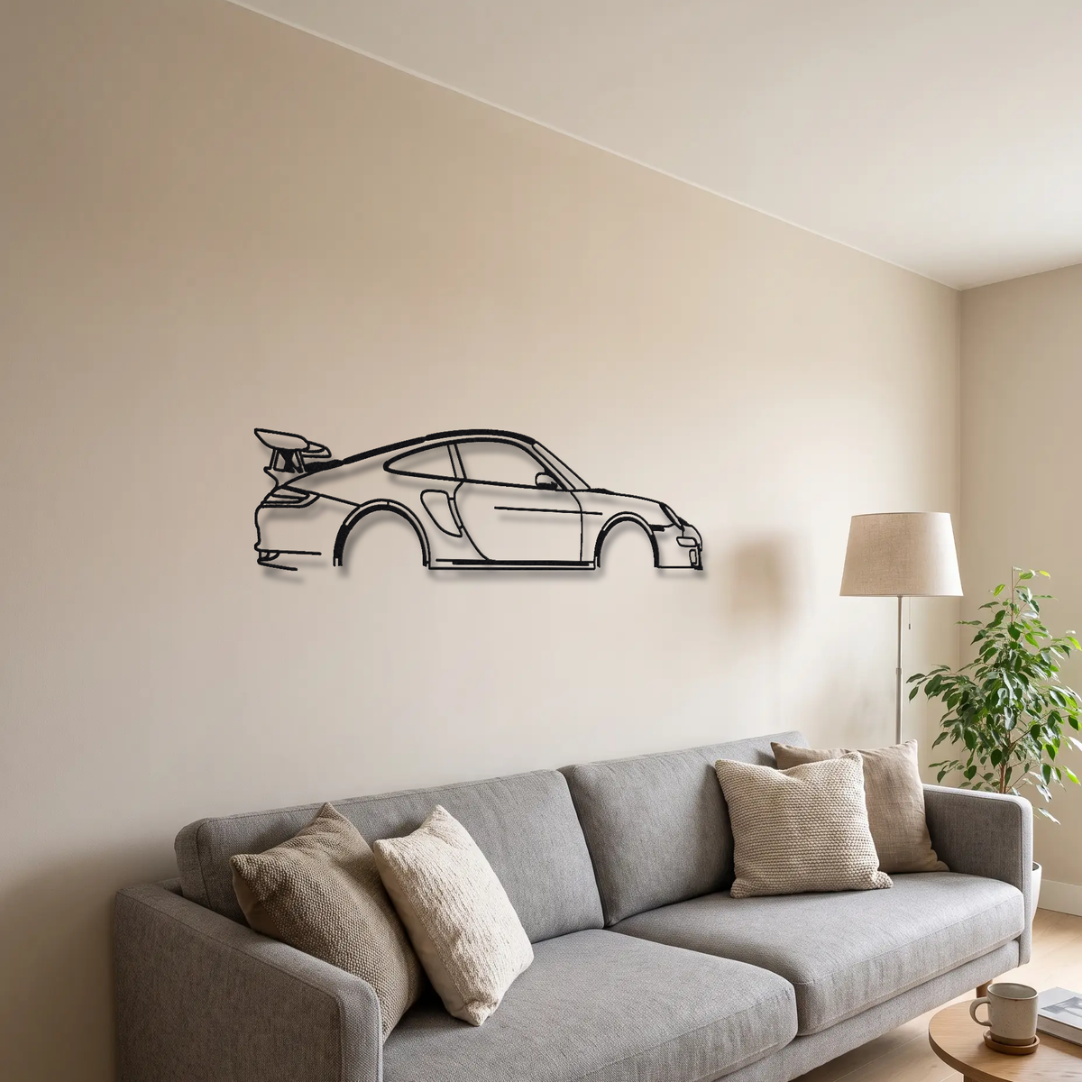 2007-09 Porsche 911 GT3 RS 997.1 metal wall art above a sofa in a living room