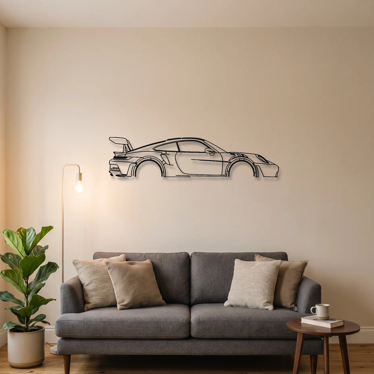 Porsche 911 GT3 RS 992 metal wall art above a sofa in a living room