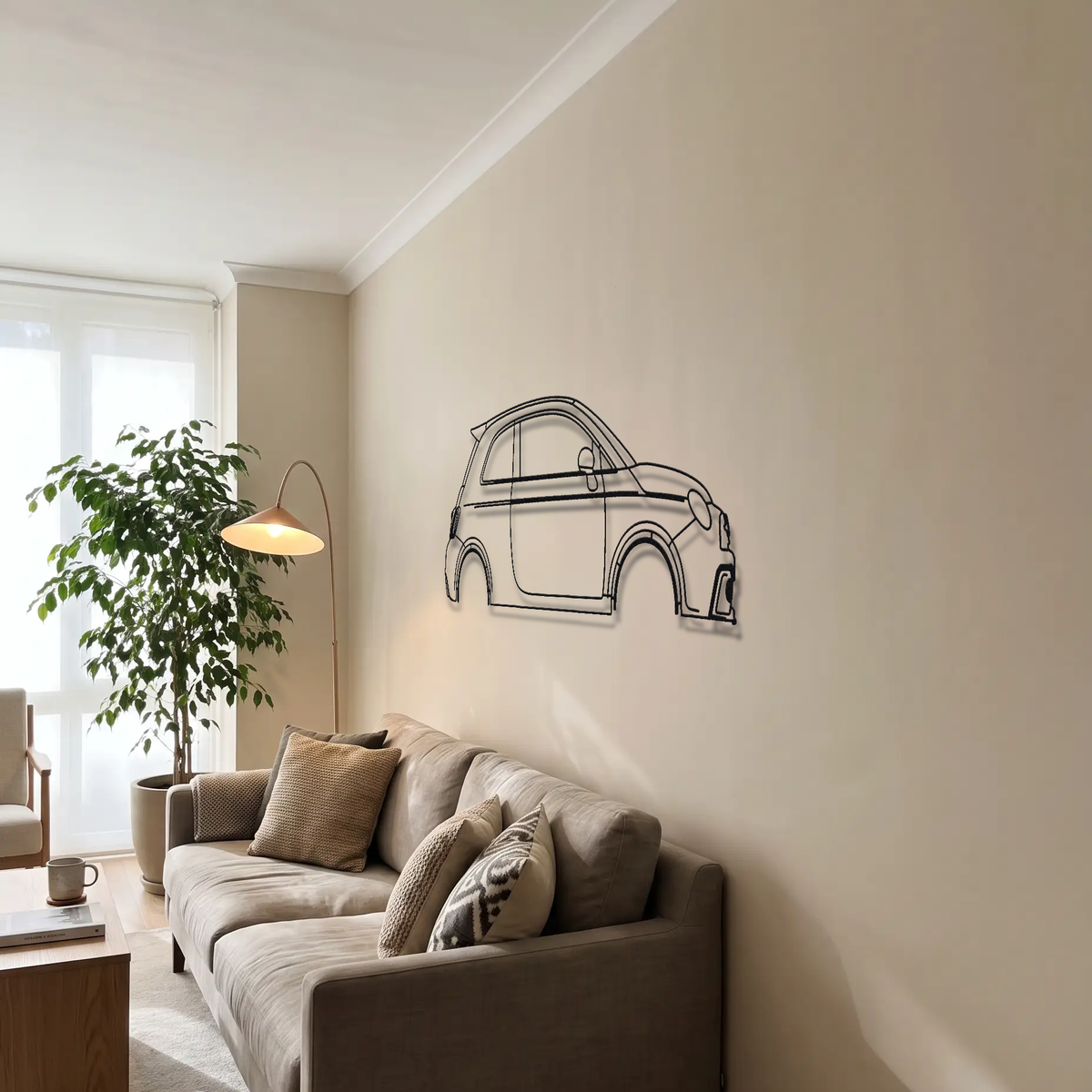 Fiat 500 Abarth metal wall art above a sofa in a living room