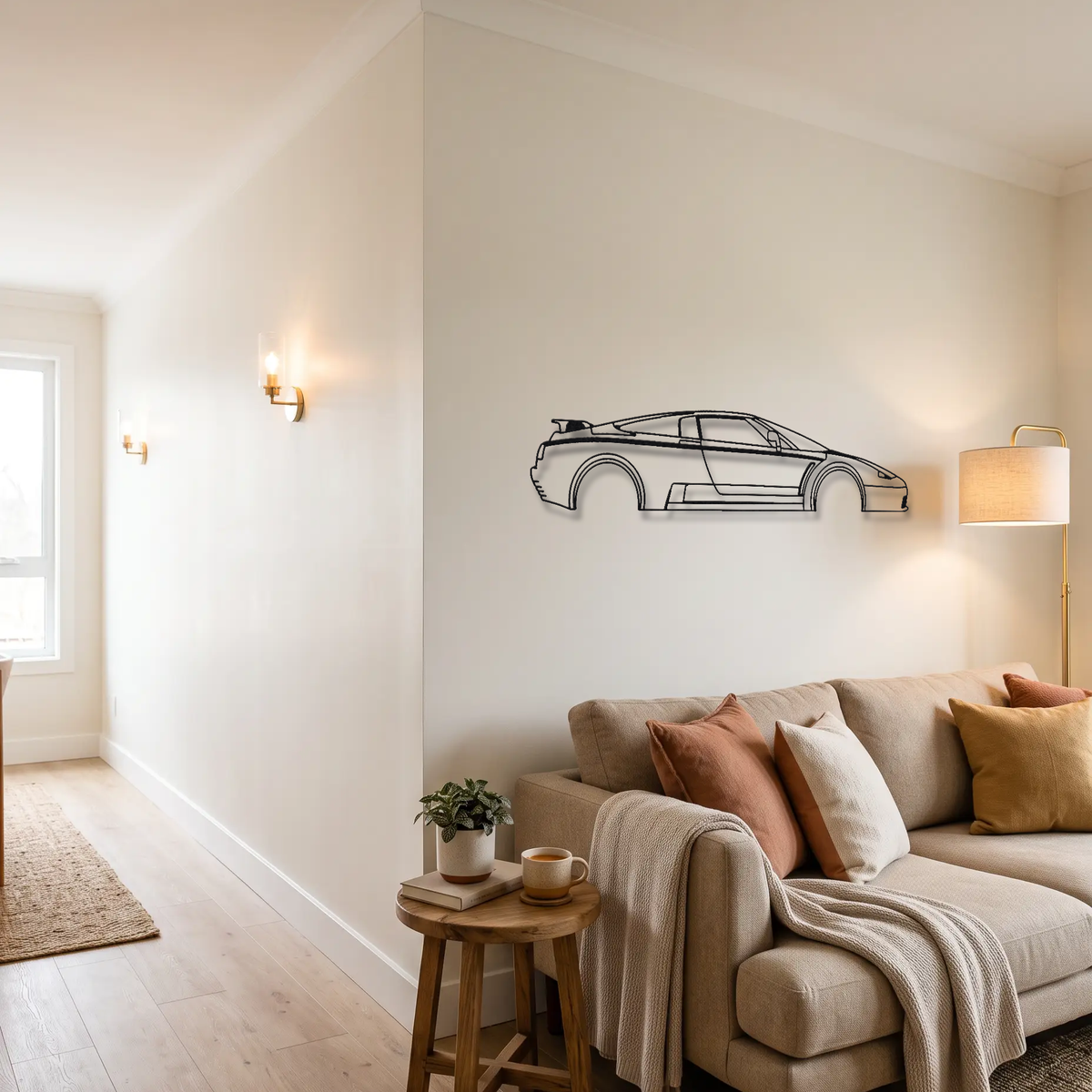 Bugatti EB110 GT metal wall art above a sofa in a living room