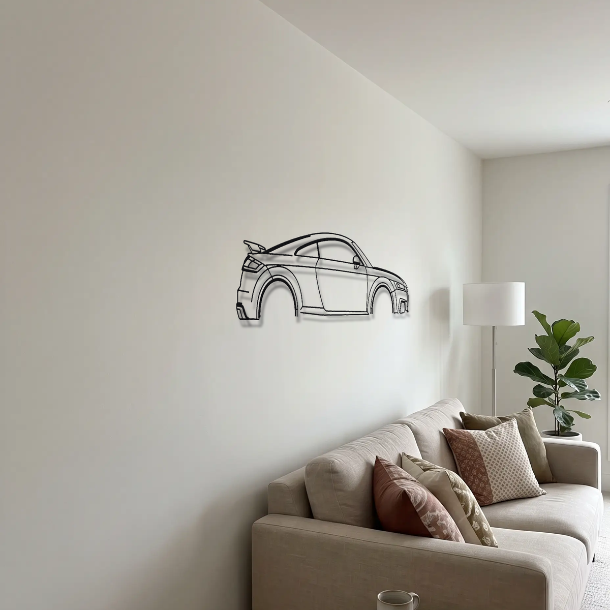 Audi TT RS 8S metal wall art above a sofa in a living room