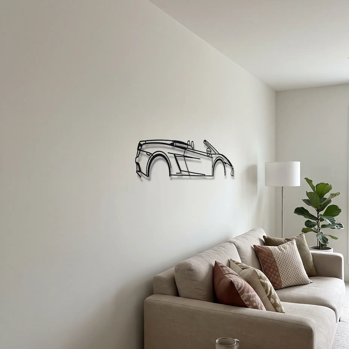 2012-13 Lamborghini Gallardo LP550-2 Spyder metal wall art above a sofa in a living room