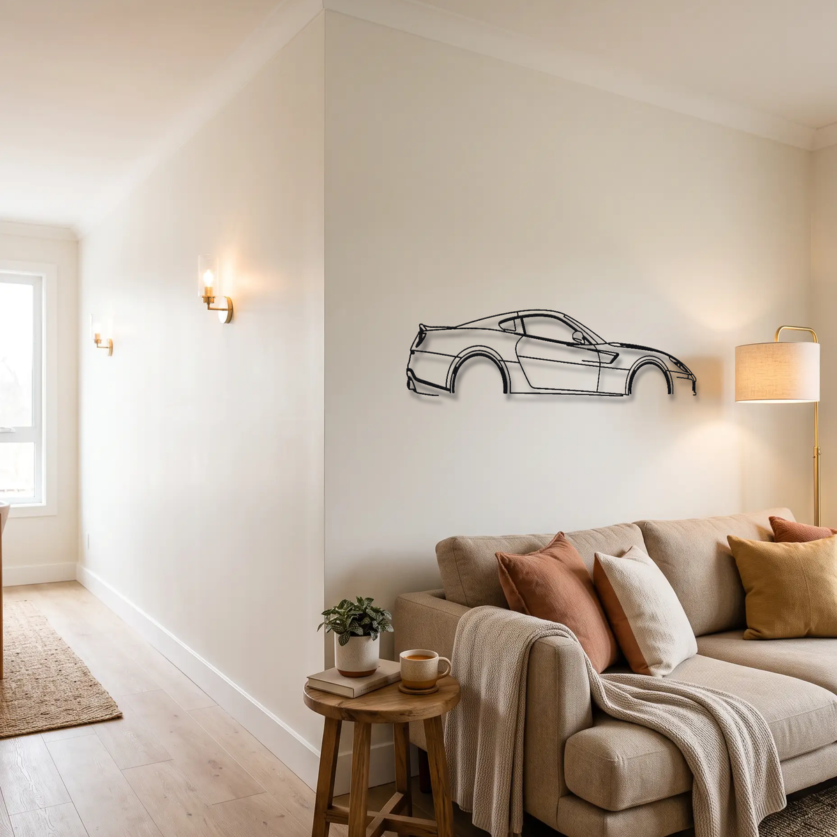 Ferrari 599 GTO metal wall art above a sofa in a living room