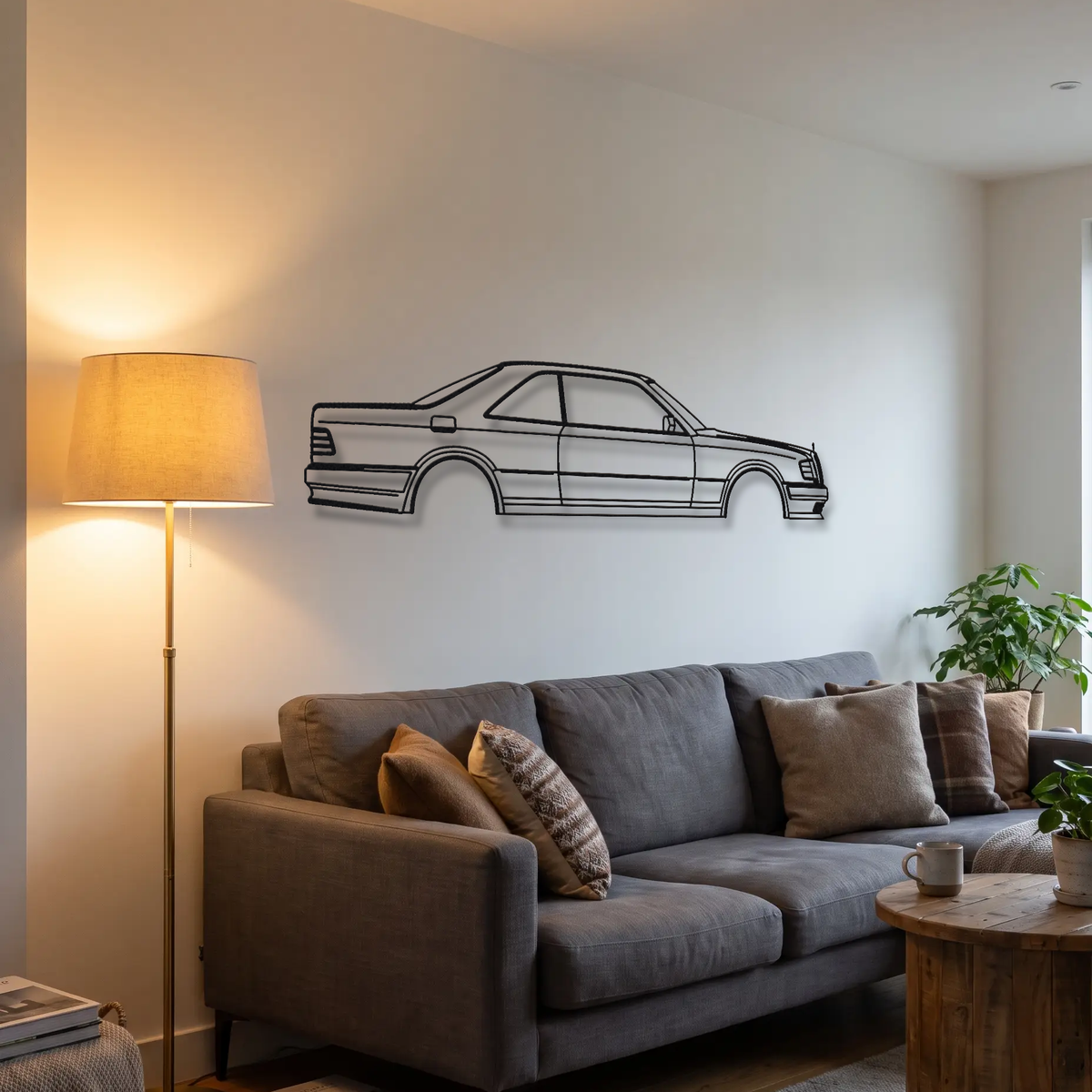 Mercedes-Benz 300 CE 6.0 AMG 'Hammer' W124 metal wall art above a sofa in a living room