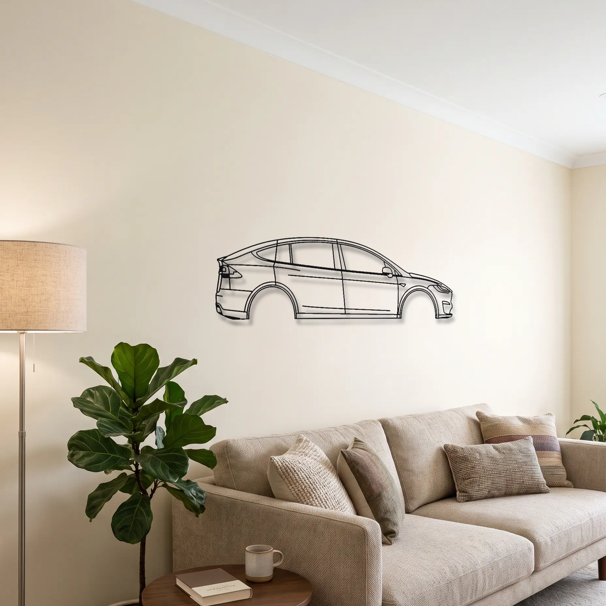 Tesla Model X Plaid metal wall art above a sofa in a living room