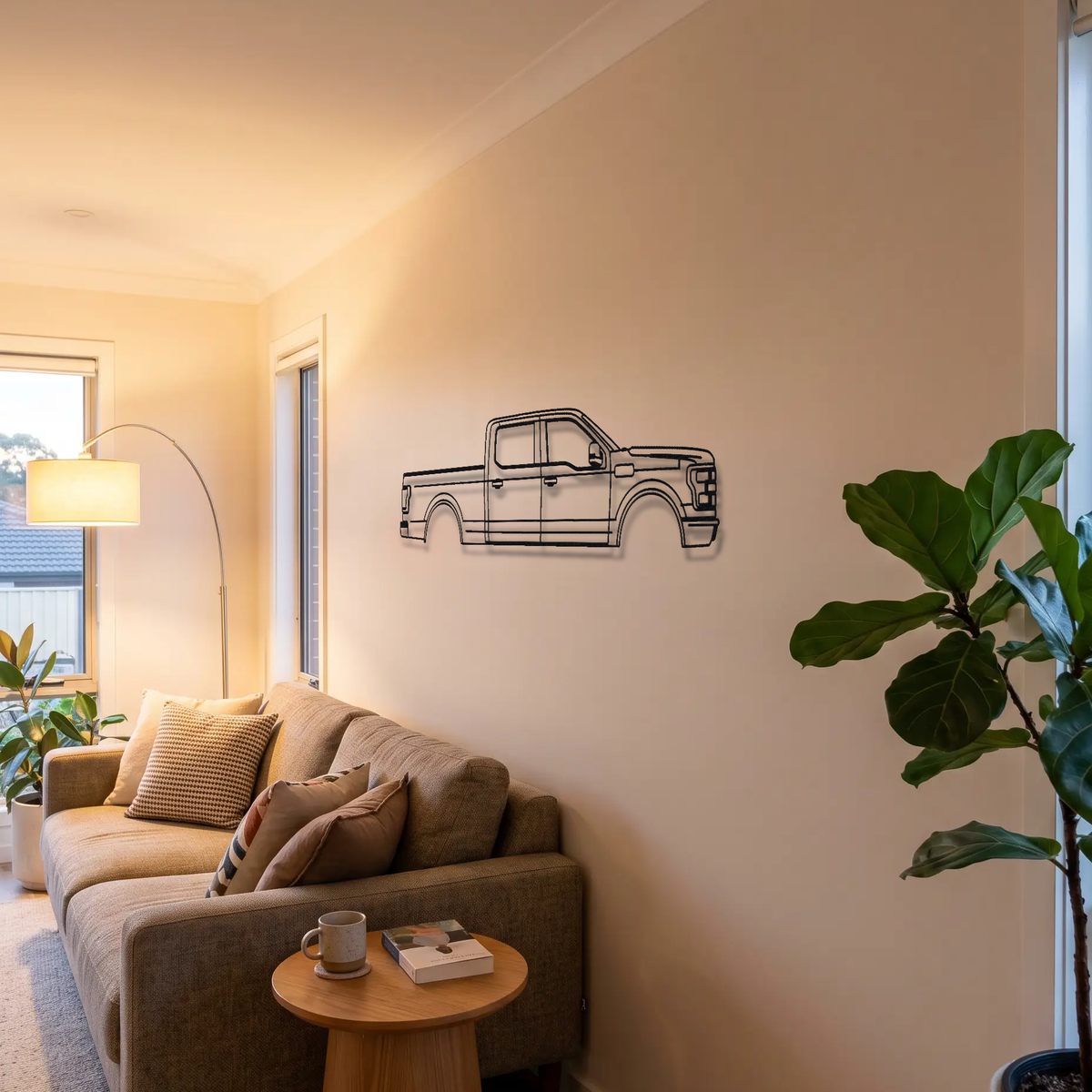 Ford F-150 P552 metal wall art above a sofa in a living room