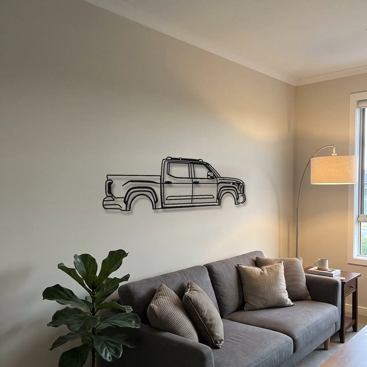 2022- Toyota Tundra TRD Pro XK70 metal wall art above a sofa in a living room