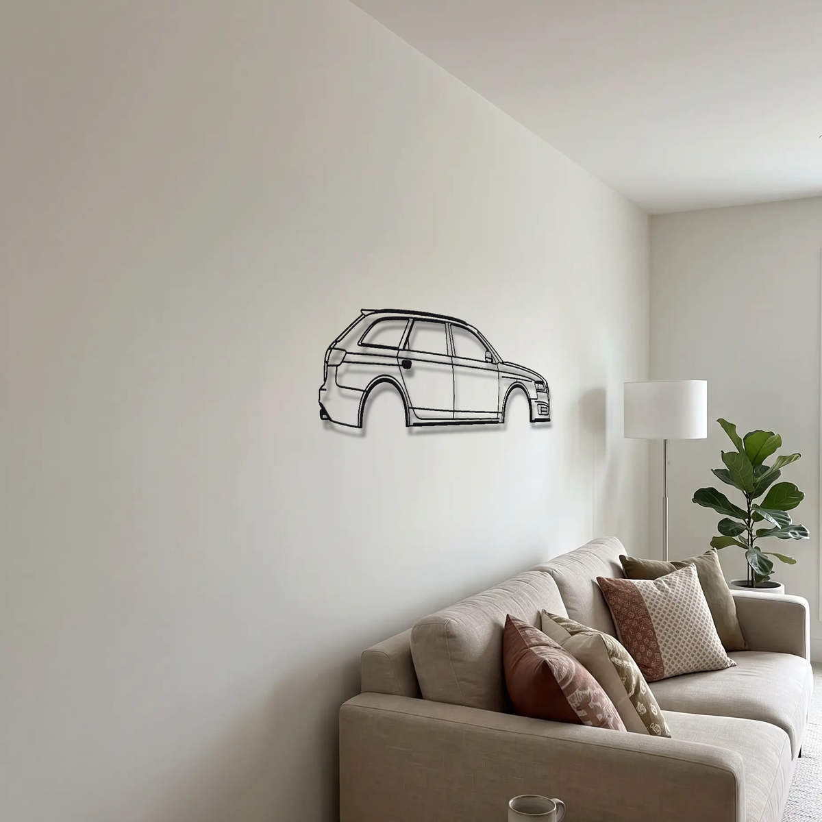 Audi RS6 Avant C6 metal wall art above a sofa in a living room