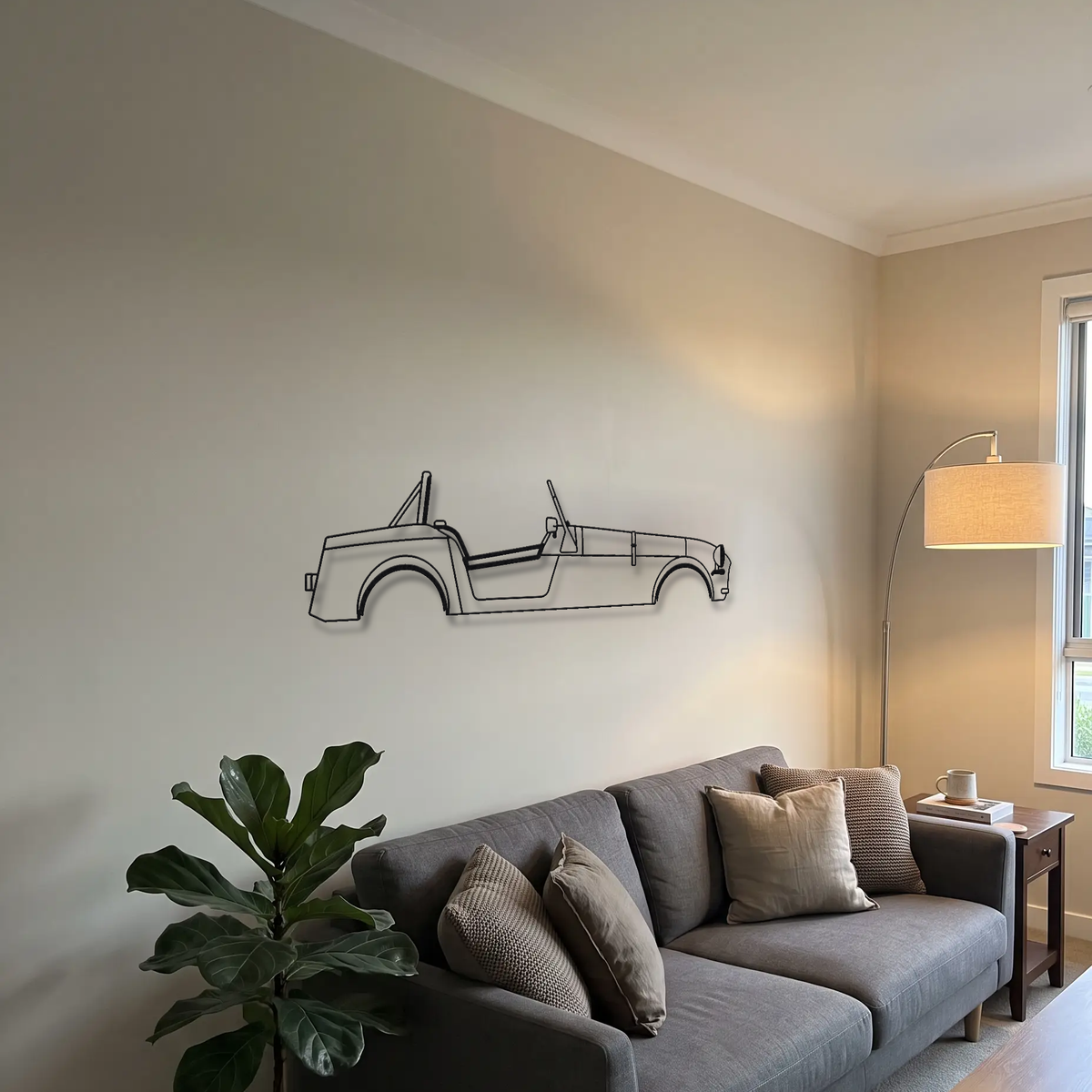 Caterham Seven 170 metal wall art above a sofa in a living room
