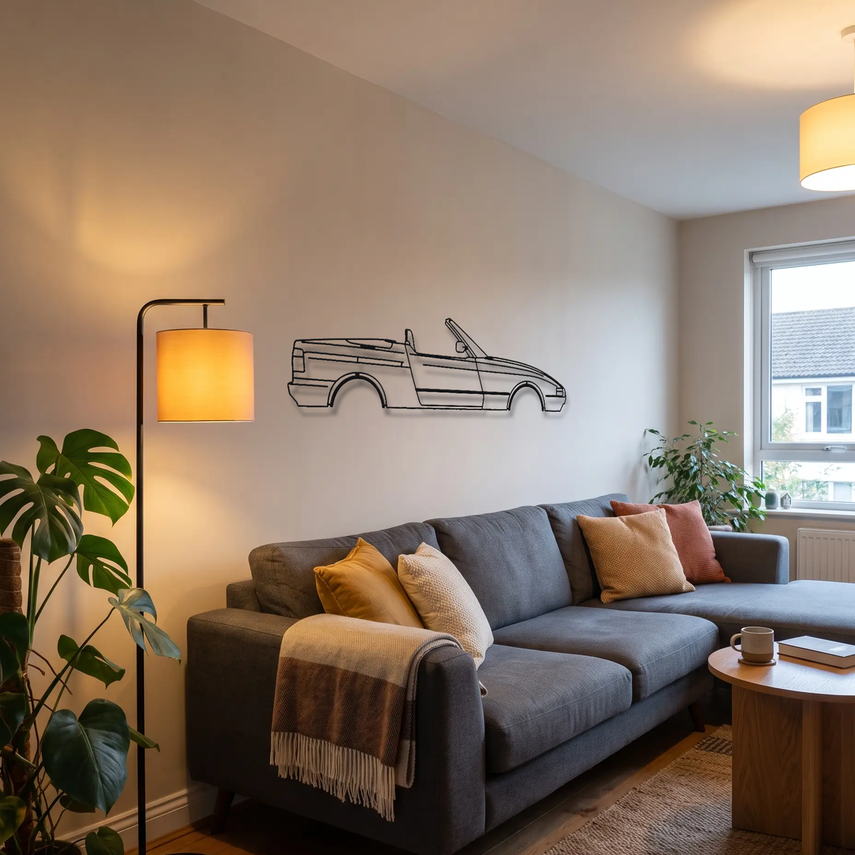 BMW Z1 metal wall art above a sofa in a living room