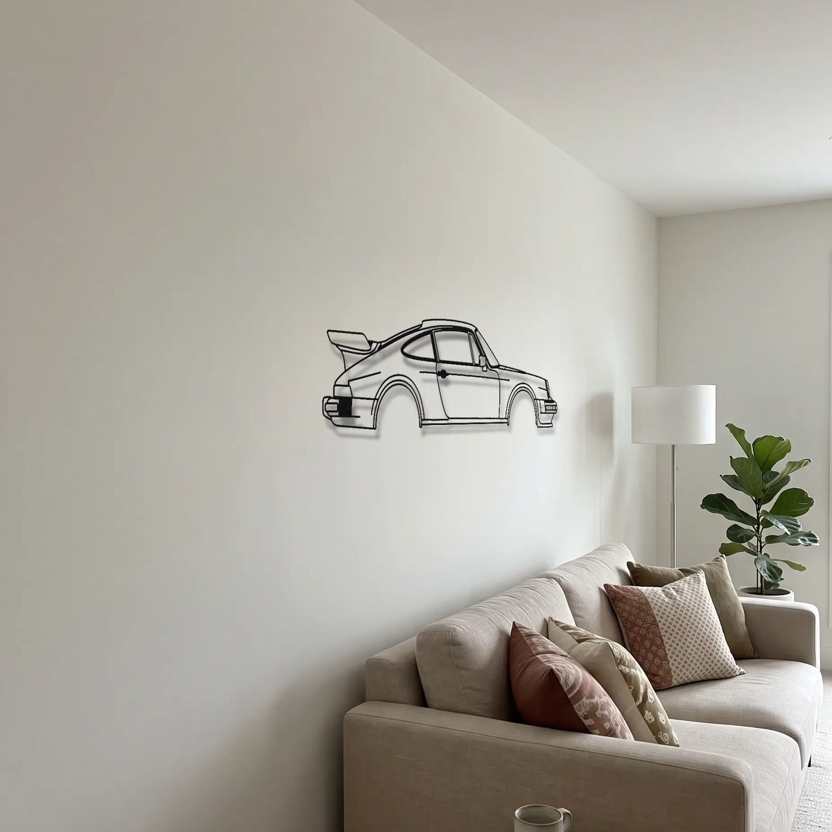 1975-1977 Porsche 930 Turbo 3 metal wall art above a sofa in a living room