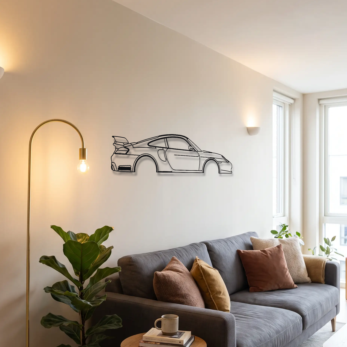 Porsche 911 GT2 996 metal wall art above a sofa in a living room
