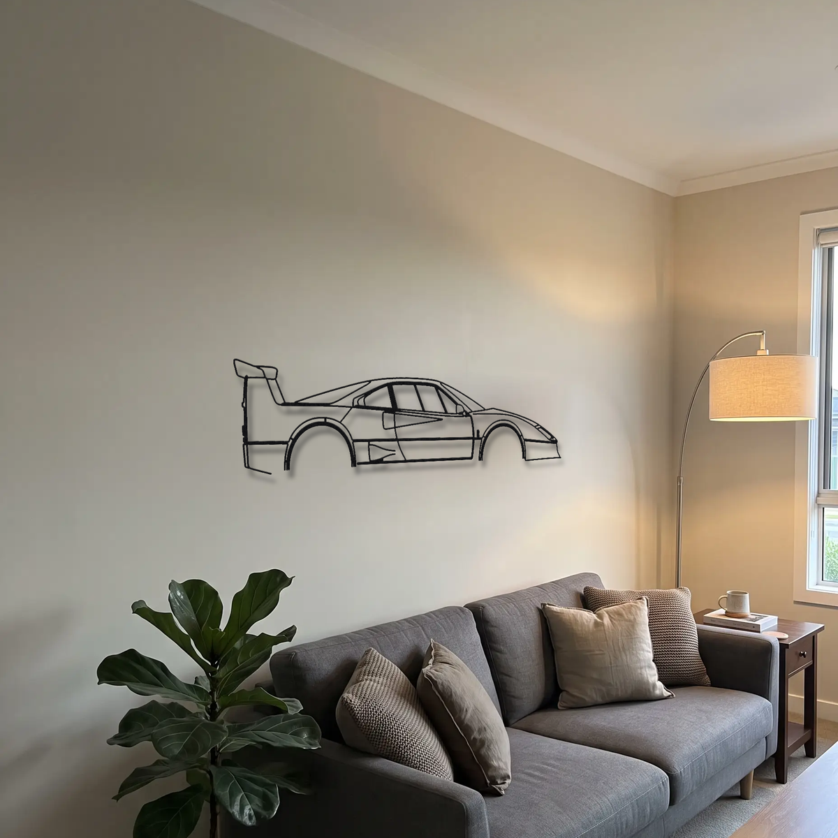 Ferrari F40 LM metal wall art above a sofa in a living room