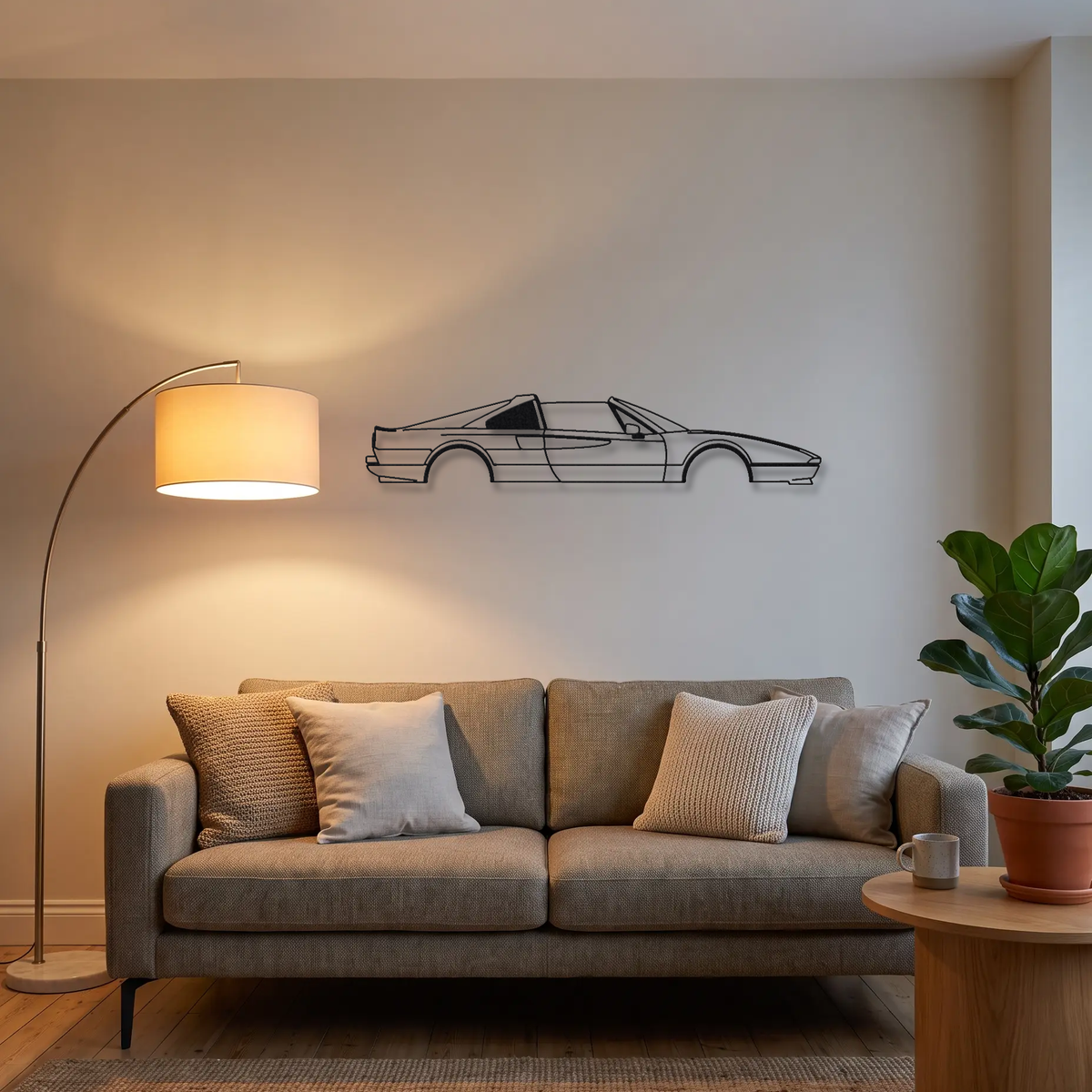 Ferrari 328 GTS metal wall art above a sofa in a living room