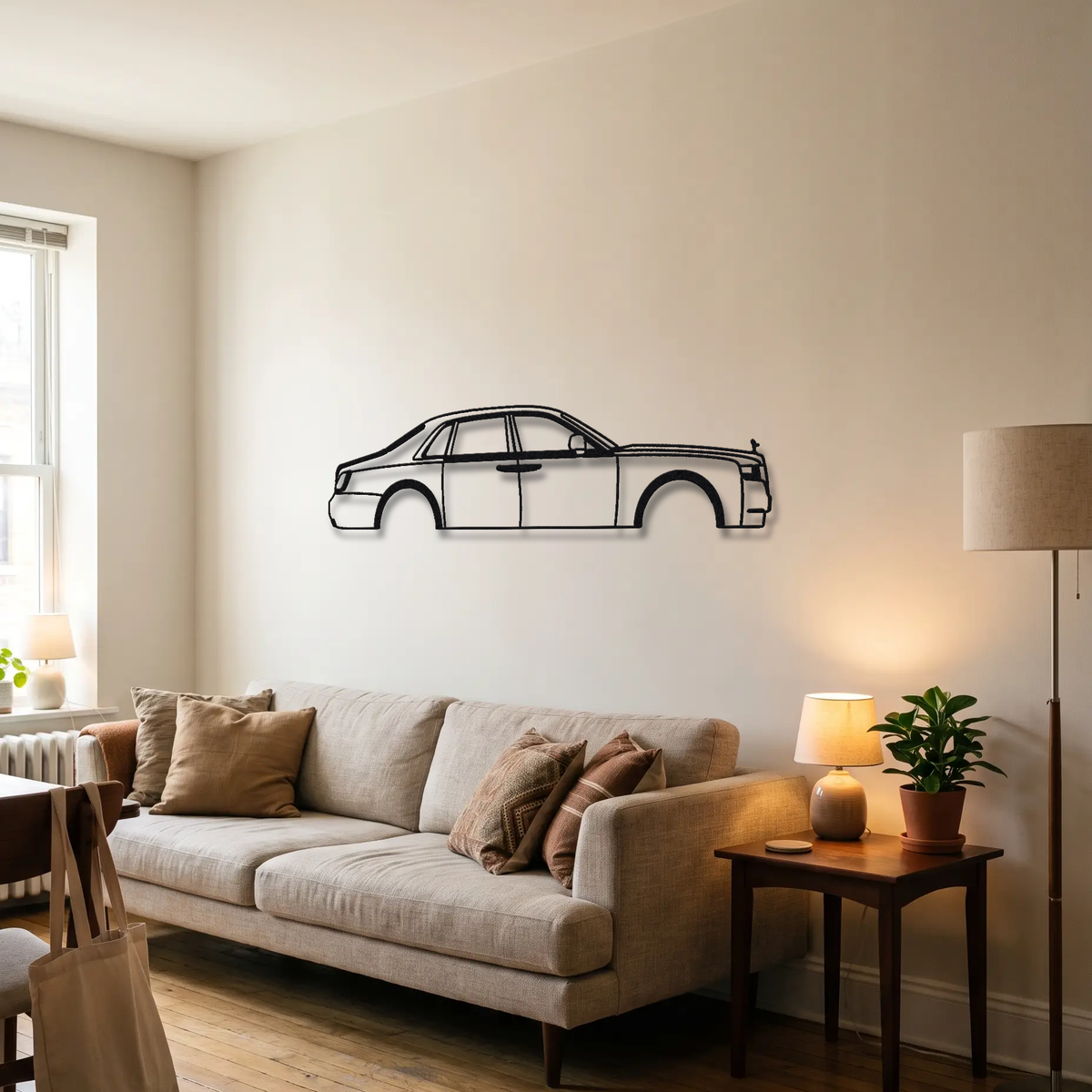 2021- Rolls-Royce Ghost Black Badge metal wall art above a sofa in a living room