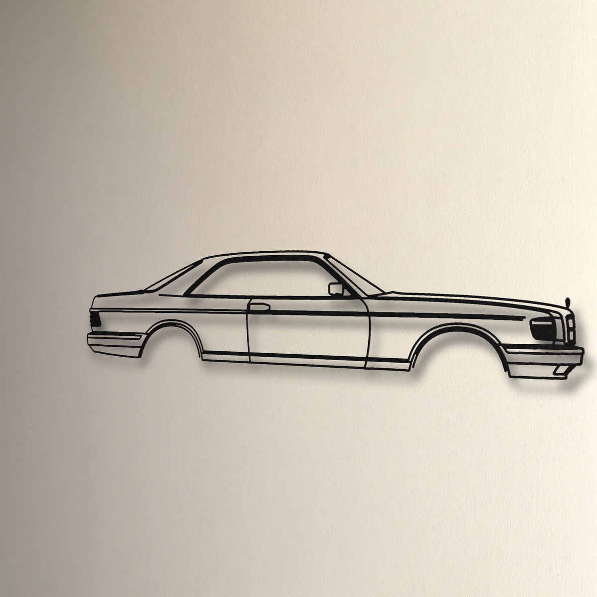 Mercedes-Benz 560 SEC C126 floating mount drop-shadow detail