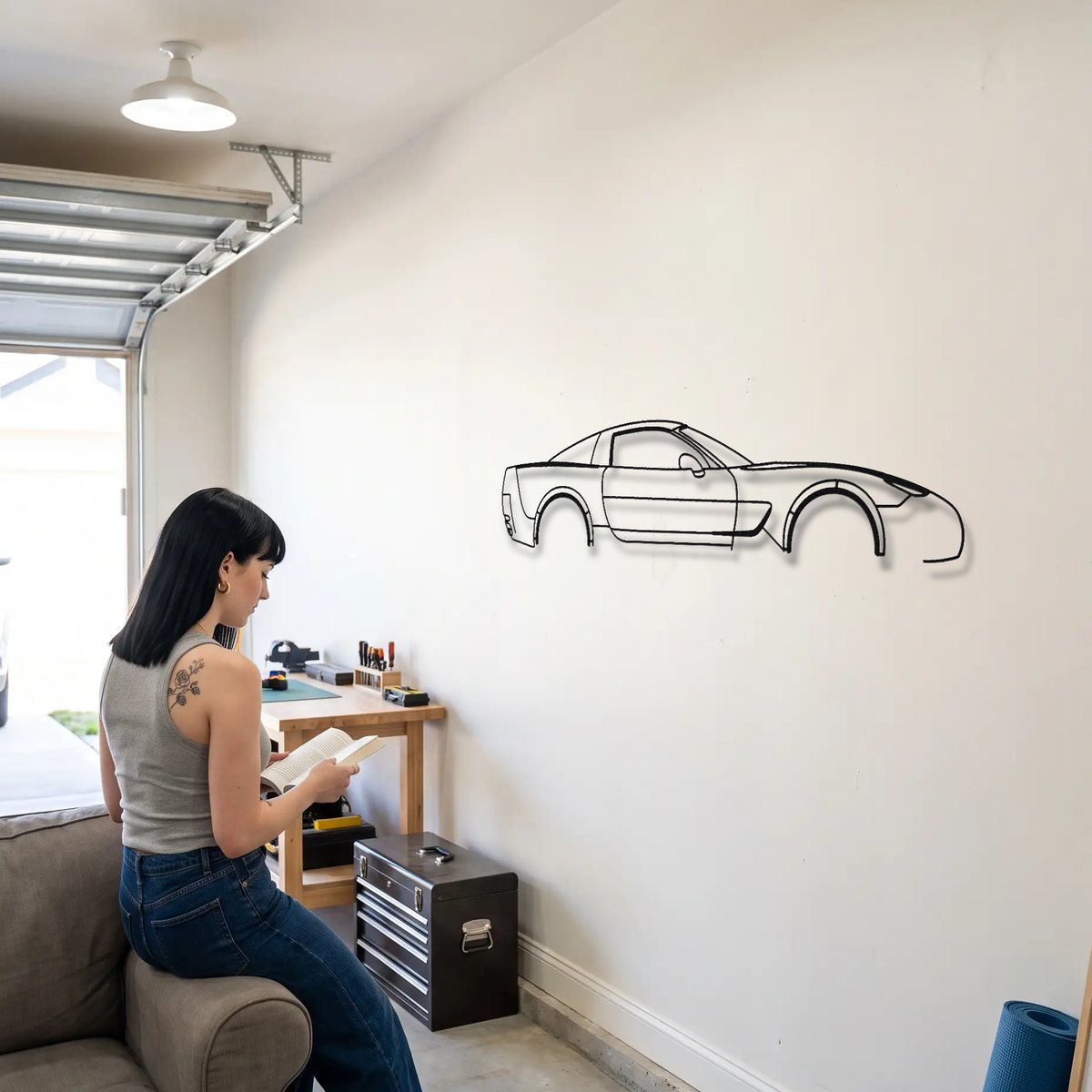 Chevrolet Corvette C5 metal wall art shown to scale beside a person