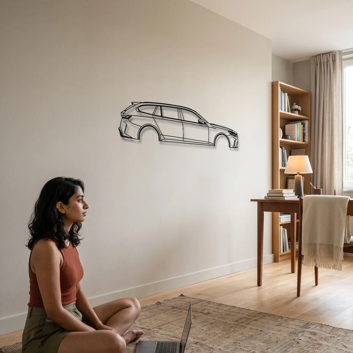 BMW M5 Touring G99 metal wall art shown to scale beside a person