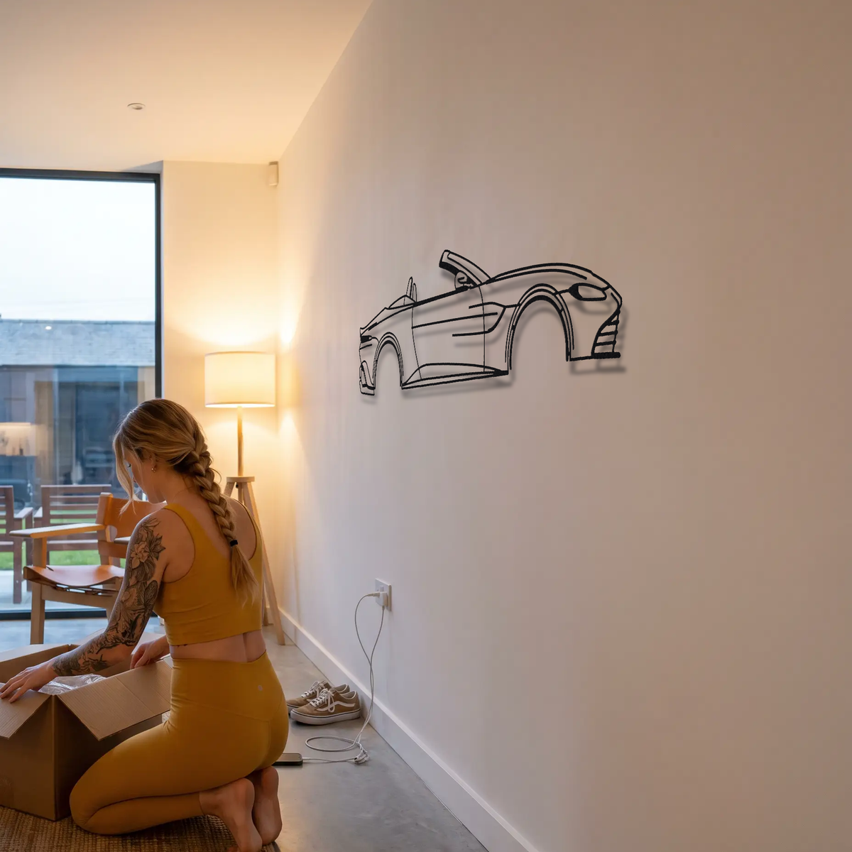 Aston Martin V8 Vantage Roadster AM6 metal wall art shown to scale beside a person