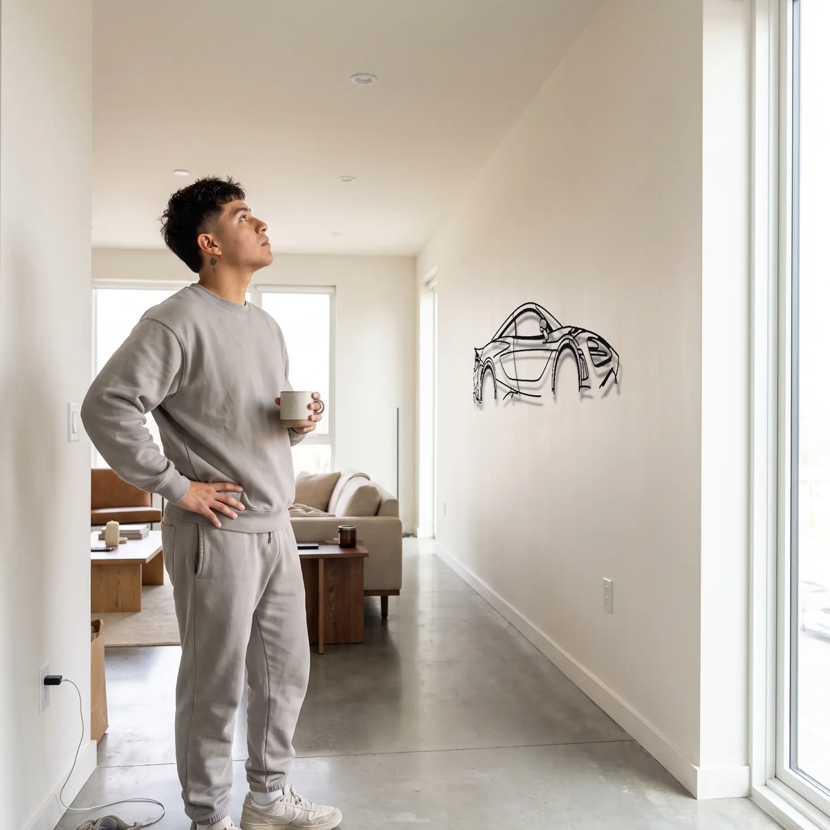 McLaren 765LT metal wall art shown to scale beside a person