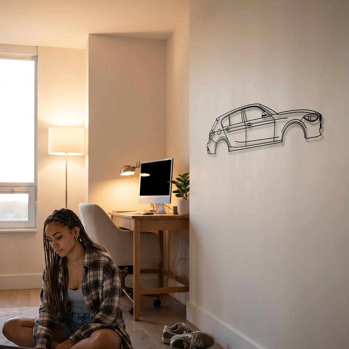 BMW M135i F20 metal wall art shown to scale beside a person