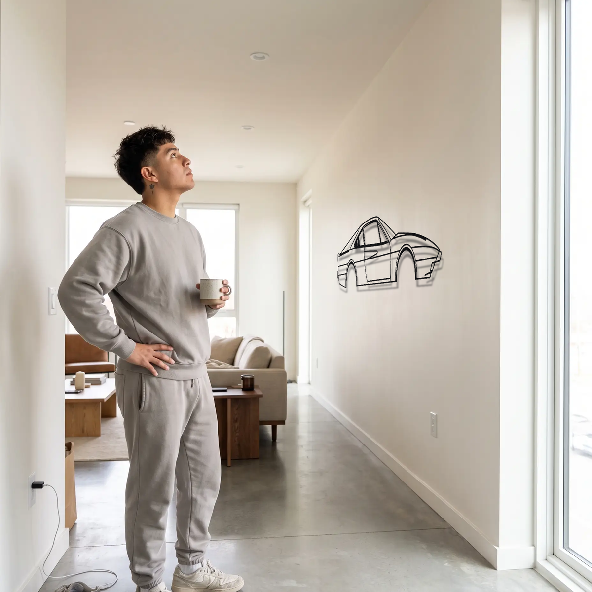 Ferrari 308 GTB metal wall art shown to scale beside a person