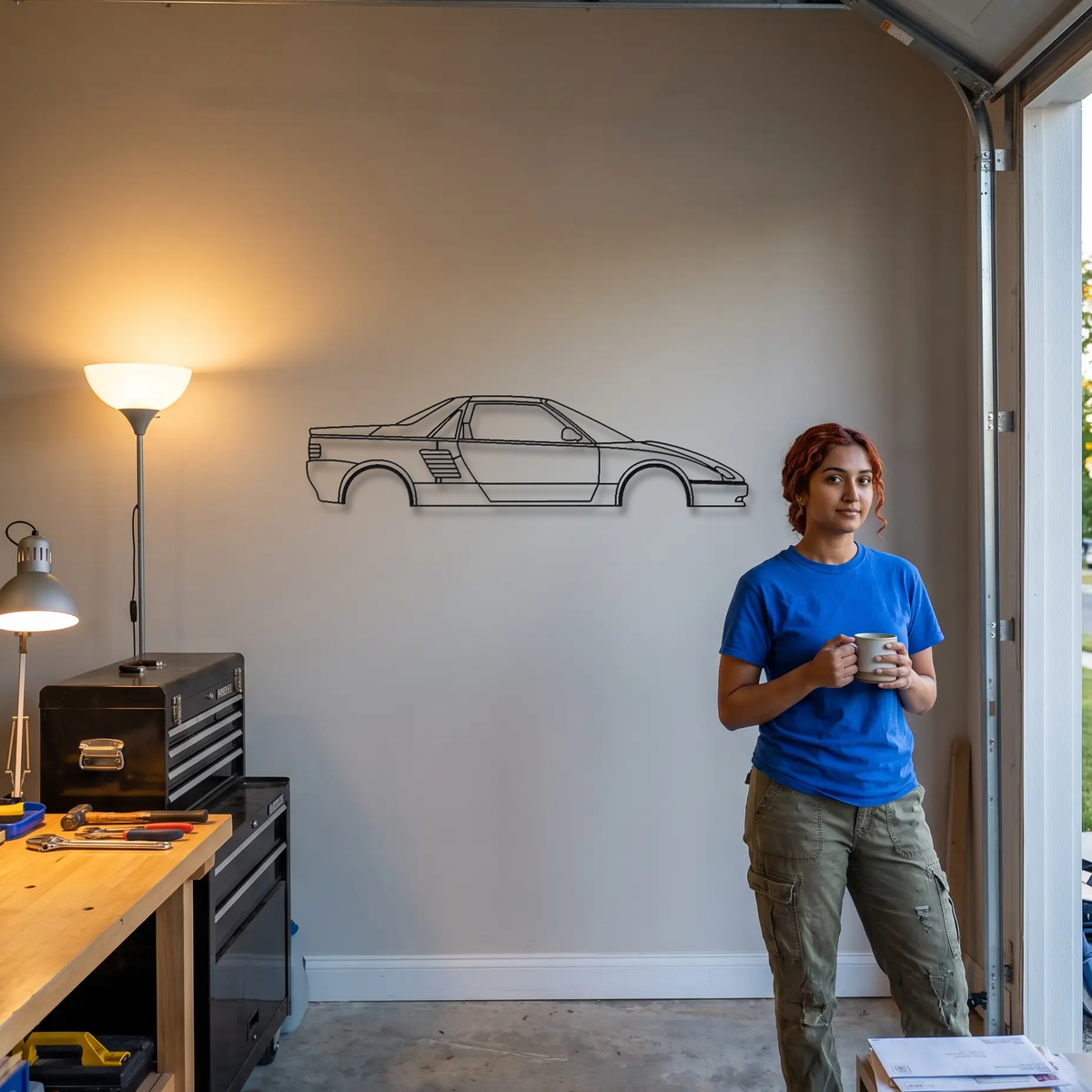 Autozam AZ-1 metal wall art shown to scale beside a person