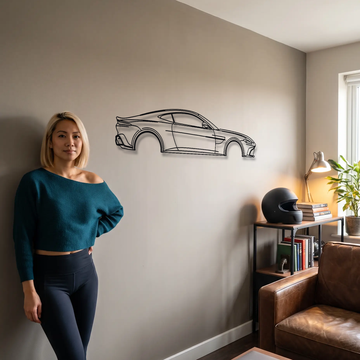 Aston Martin Vantage Facelift metal wall art shown to scale beside a person