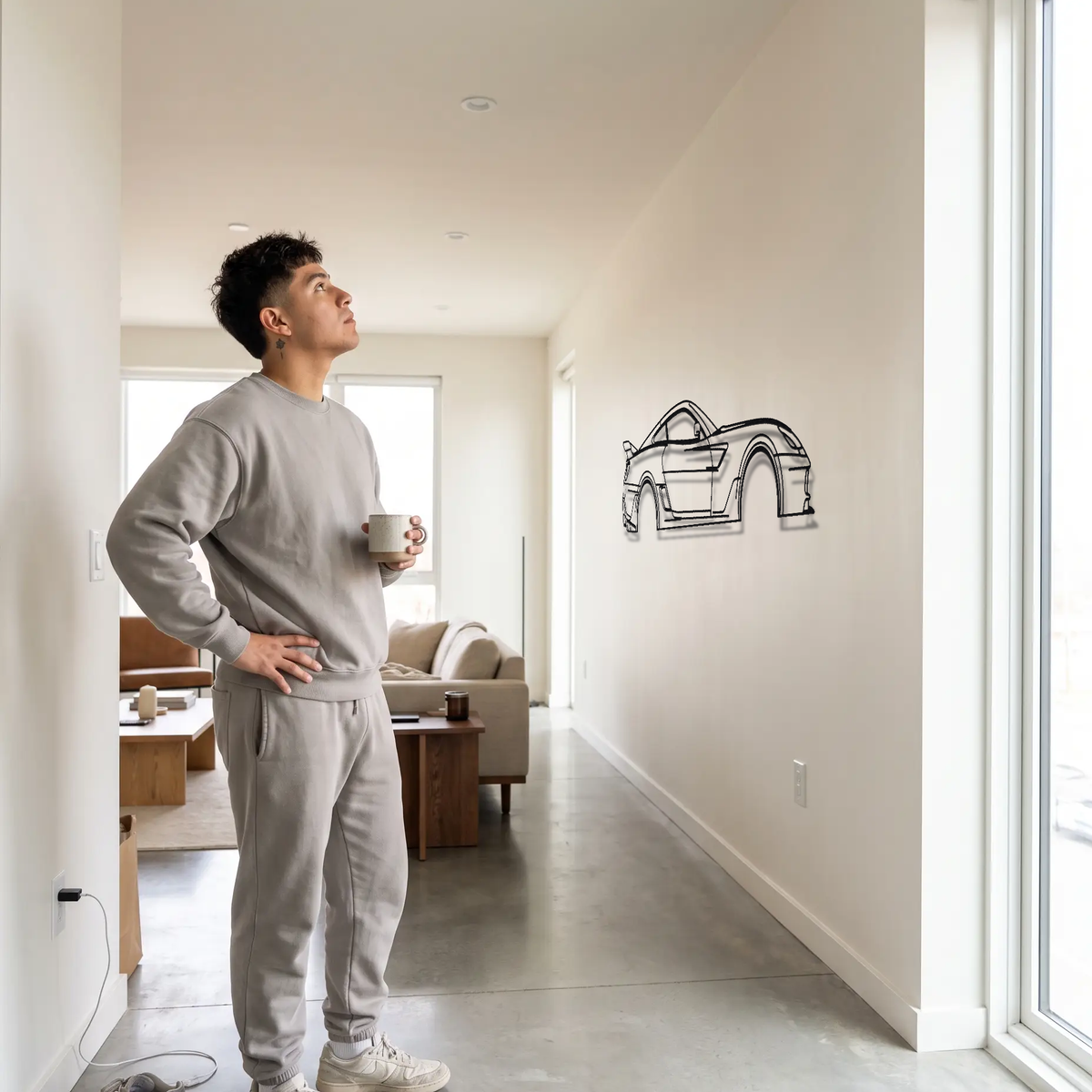 Ferrari 599XX Evo metal wall art shown to scale beside a person